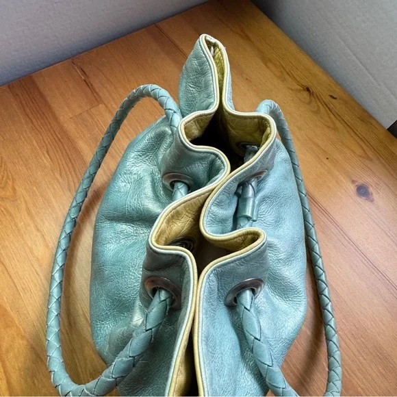 Susan Farber Collections turquoise bag with signature leather vintage